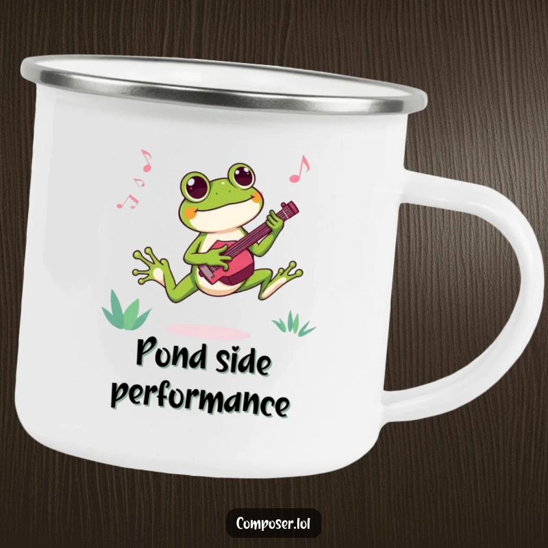 Funny camping mug showing a joyful frog composer leaping with excitement while composing a tune, perfect for outdoor music enjoyment.