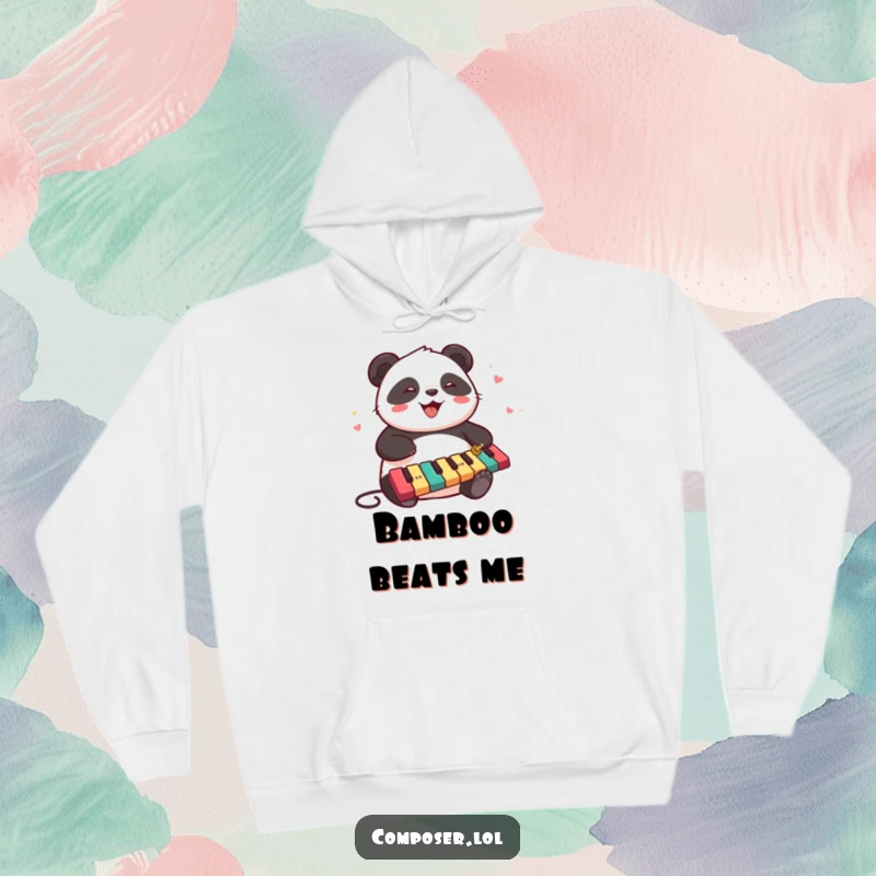 Funny, chubby panda happily playing a xylophone with many colorful keys, depicted on a soft hoodie.