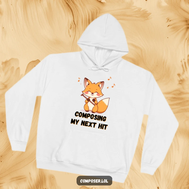 Funny Fox Composer Hoodie, featuring a smiling fox engrossed in writing musical notation with lively notes swirling.