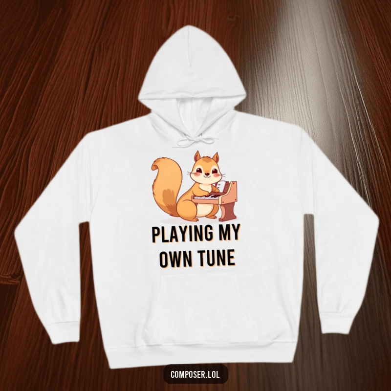 Funny Squirrel Hoodie: A happy squirrel plays a tiny piano with nimble paws, perfect for cozy, musical moments.