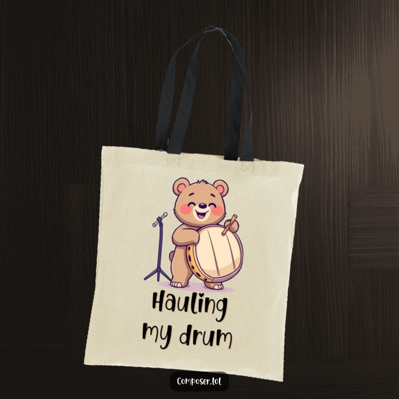 Funny, playful bear joyfully drumming on a large drum, printed on a sturdy tote bag. Ideal for carrying gear.